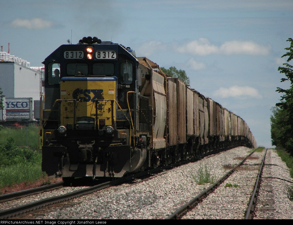 G028-05 working hard up the hill with 65 cars